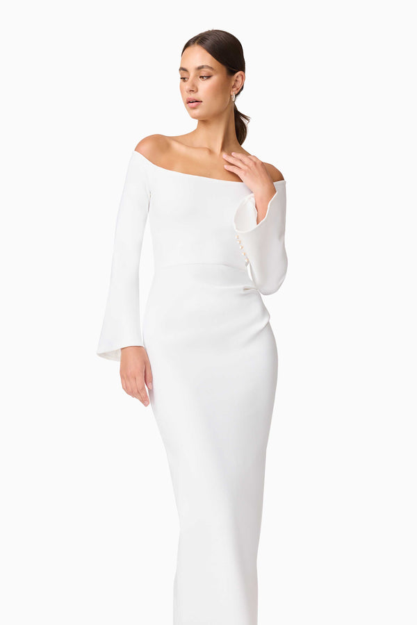 Brunette model wearing Sonya Long Sleeve Midi Dress in White close up shot