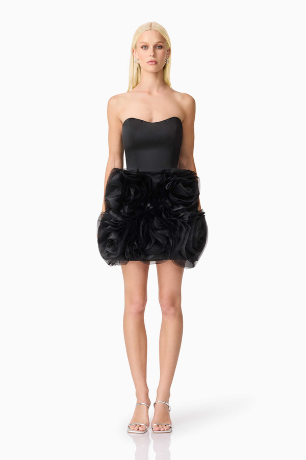 Blonde model wearing Asher Strapless Mini Dress in Black front shot