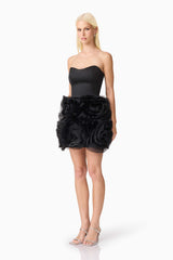 Blonde model wearing Asher Strapless Mini Dress in Black side shot