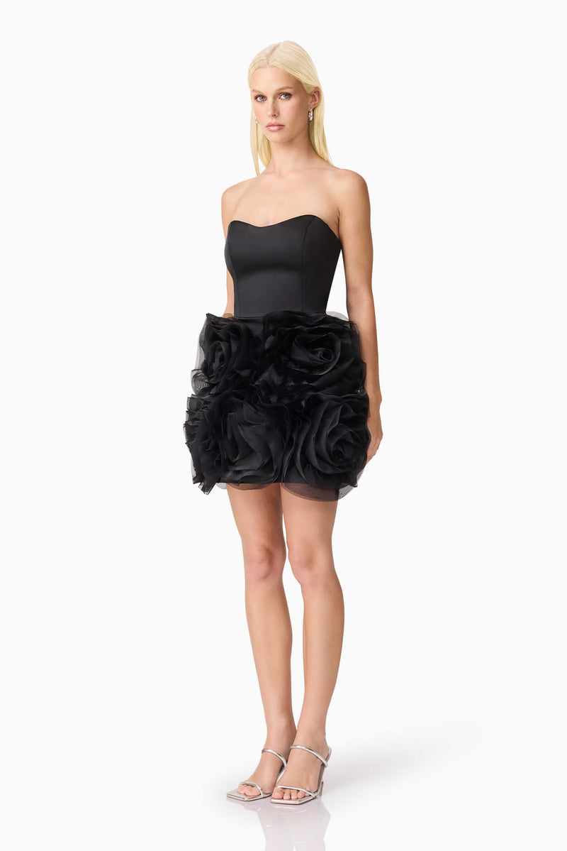 Blonde model wearing Asher Strapless Mini Dress in Black side shot