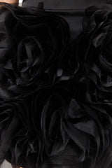 Blonde model wearing Asher Strapless Mini Dress in Black detailing shot