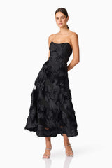 Brunette model wearing Asher Sweetheart Midi Dress in Black front shot hands behind dress
