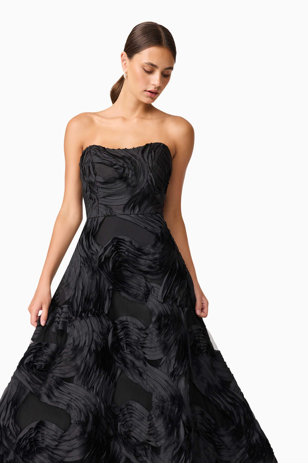 Brunette model wearing Asher Sweetheart Midi Dress in Black close up shot