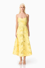 Blonde model wearing Asher Sweetheart Midi Dress in Yellow front shot