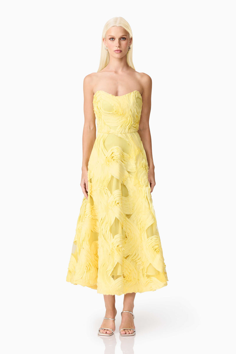 Blonde model wearing Asher Sweetheart Midi Dress in Yellow front shot