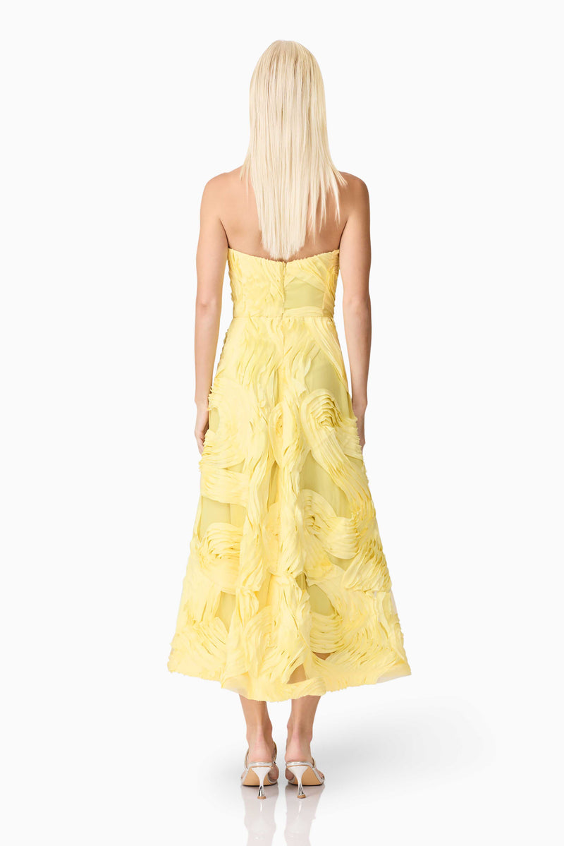 Blonde model wearing Asher Sweetheart Midi Dress in Yellow back shot