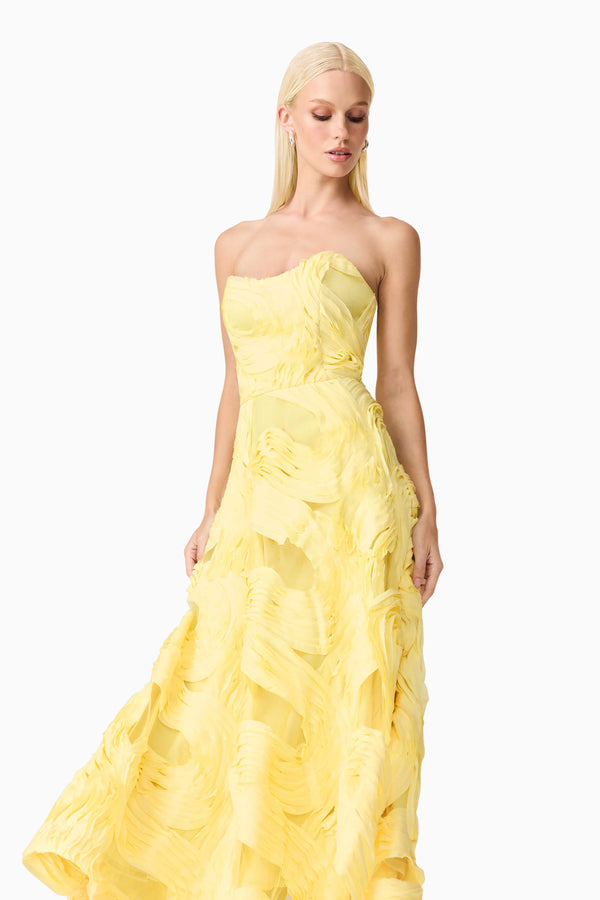 Blonde model wearing Asher Sweetheart Midi Dress in Yellow close up shot