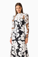 Bloomnoir Long Sleeve Maxi Dress in Black & White with a high neckline, sheer long sleeves & fit & flare fit detail shot