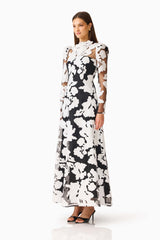 Bloomnoir Long Sleeve Maxi Dress in Black & White with a high neckline, sheer long sleeves & fit & flare fit side shot