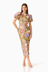 Fiora Puff Sleeve Midi Dress in Green  & Pink Floral with a round neckline, puff sleeves & floral embroidery posed hand on hip shot