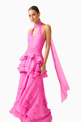 Rosera Halter Gown in Pink side shot featuring a collared halter neckline and tier ruffle skirt detail