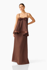 Rosera Satin Bow Maxi Dress in Chocolate Brown posed shot featuring strapless neckline and ribbon bow detail