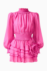 Rosera Long Sleeve Playsuit in Pink with a tiered skirt and long balloon sleeves ghost shot