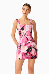 Lumiflora A-Line Mini Dress in Pink Floral with printed jacquard fabrication & flap pockets close up shot