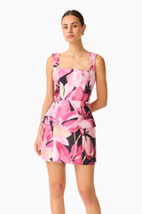 Lumiflora A-Line Mini Dress in Pink Floral with printed jacquard fabrication & flap pockets close up shot