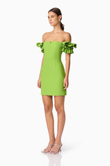 Brunette model wearing Nola Off The Shoulder Mini Dress in Green side shot