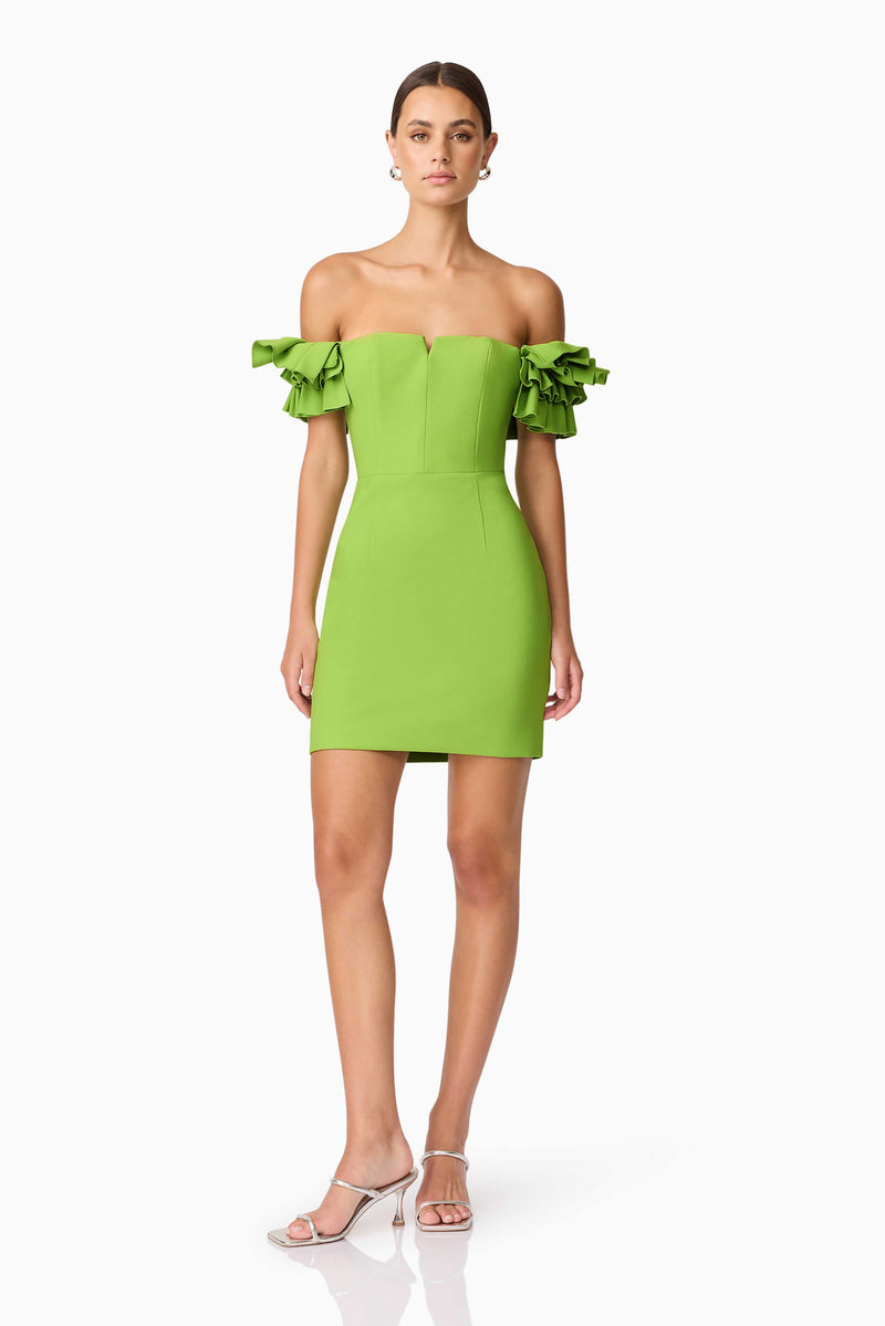 Brunette model wearing Nola Off The Shoulder Mini Dress in Green posed shot