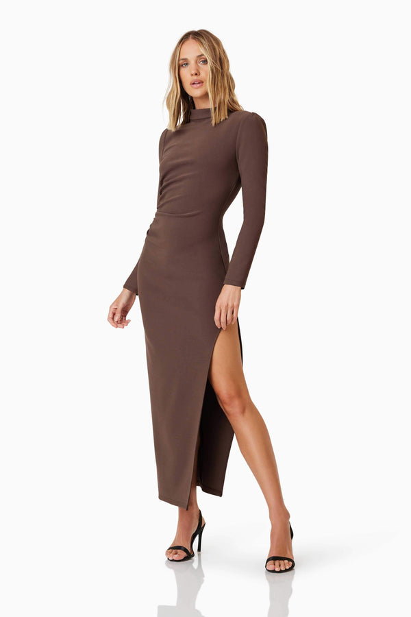 Blonde model wearing Nola Long Sleeve Maxi Dress In Brown side shot
