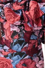 Brunette model wearing Delphine Off The Shoulder Midi Dress in Pink & Back Floral detail shot