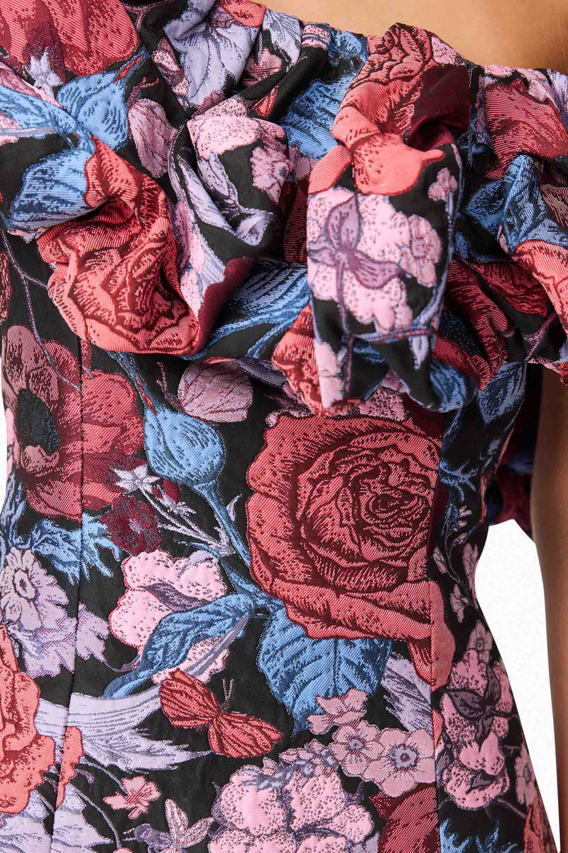 Brunette model wearing Delphine One Shoulder Mini Dress in Pink & Black Floral detail shot