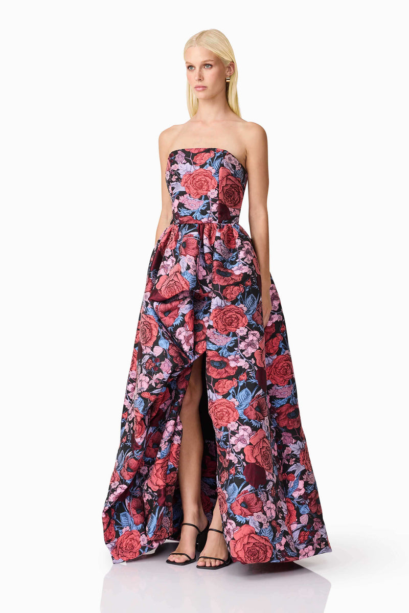 Blonde model wearing Delphine Strapless Gown in Pink & Black Floral side shot