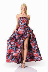 Blonde model wearing Delphine Strapless Gown in Pink & Black Floral posed shot
