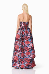 Blonde model wearing Delphine Strapless Gown in Pink & Black Floral back shot
