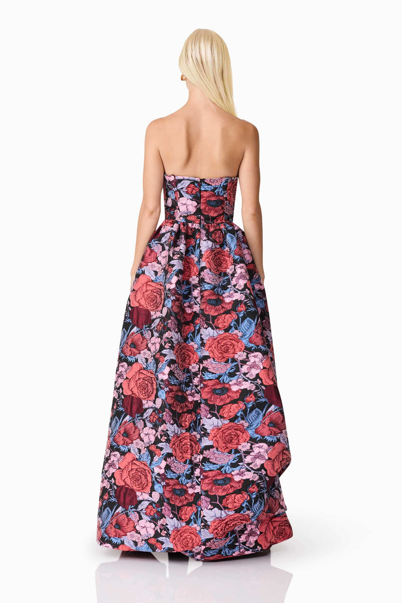 Blonde model wearing Delphine Strapless Gown in Pink & Black Floral back shot