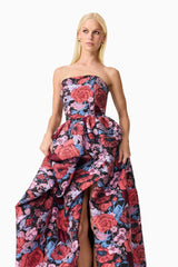 Blonde model wearing Delphine Strapless Gown in Pink & Black Floral close up shot