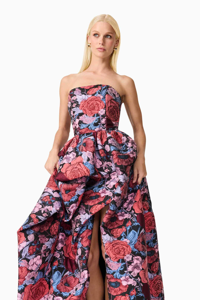 Blonde model wearing Delphine Strapless Gown in Pink & Black Floral close up shot