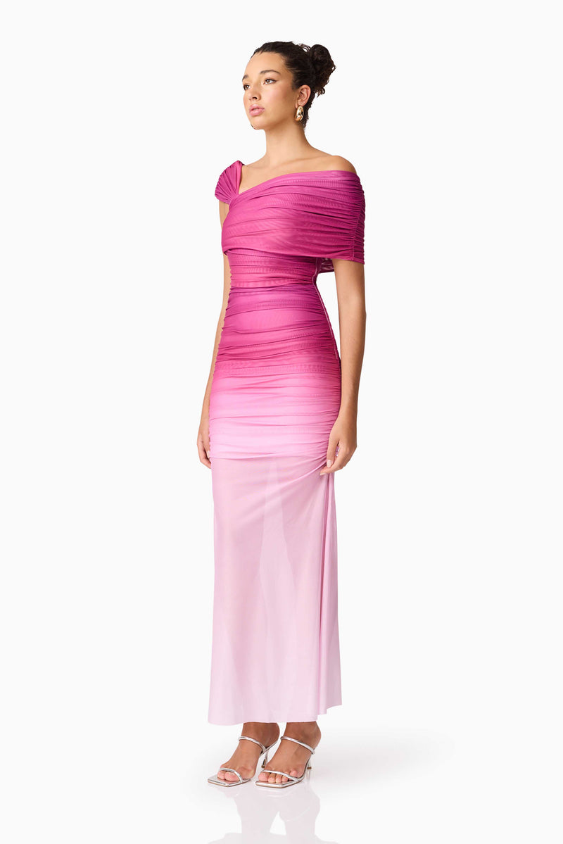 Brunette model wearing the Brigitta Maxi Dress in Pink side shot