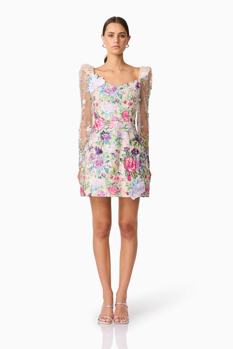 Brunette model wearing Eliska Long Sleeve Mini Dress in Floral front shot
