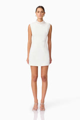 Blonde model wearing Rafaela Mini Shift Dress in White front shot