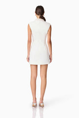 Blonde model wearing Rafaela Mini Shift Dress in White back shot
