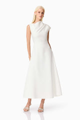 Brunette model wearing the Rafaela Midi Dress in White posed shot