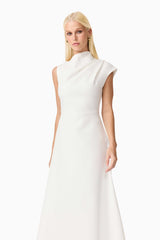 Brunette model wearing the Rafaela Midi Dress in White close up shot