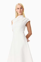 Brunette model wearing the Rafaela Midi Dress in White detail shot