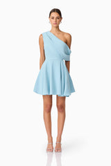 Brunette model wearing Elinor One Shoulder Mini Dress in Blue front shot