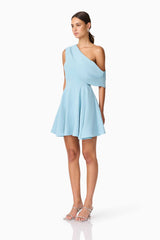 Brunette model wearing Elinor One Shoulder Mini Dress in Blue side shot