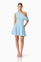 Brunette model wearing Elinor One Shoulder Mini Dress in Blue posed shot