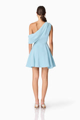 Brunette model wearing Elinor One Shoulder Mini Dress in Blue back shot