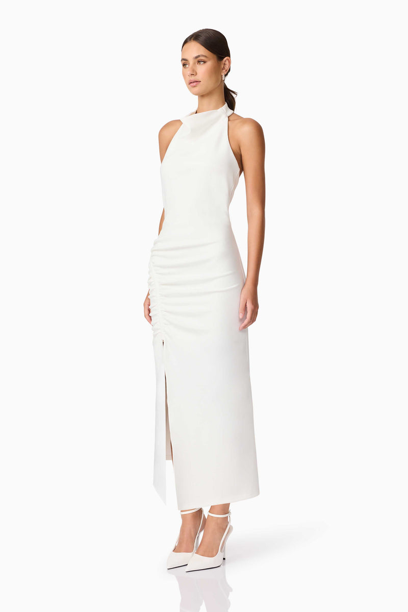 Brunette model wearing Nerissa Cowl Neck Maxi Dress in White side shot