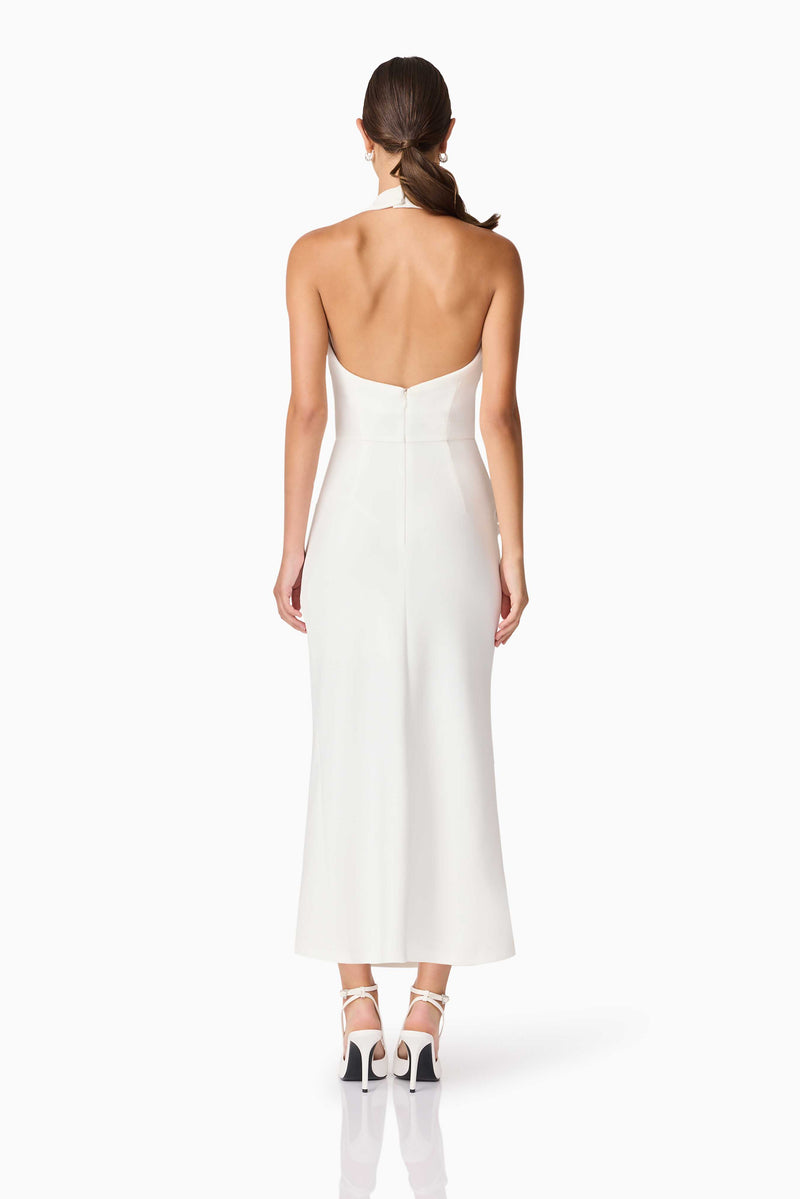 Brunette model wearing Nerissa Cowl Neck Maxi Dress in White back shot