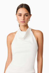 Brunette model wearing Nerissa Cowl Neck Maxi Dress in White close up shot