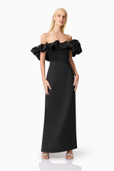 Blonde model wearing Sharon Off The Shoulder Midi Dress in Black posed shot