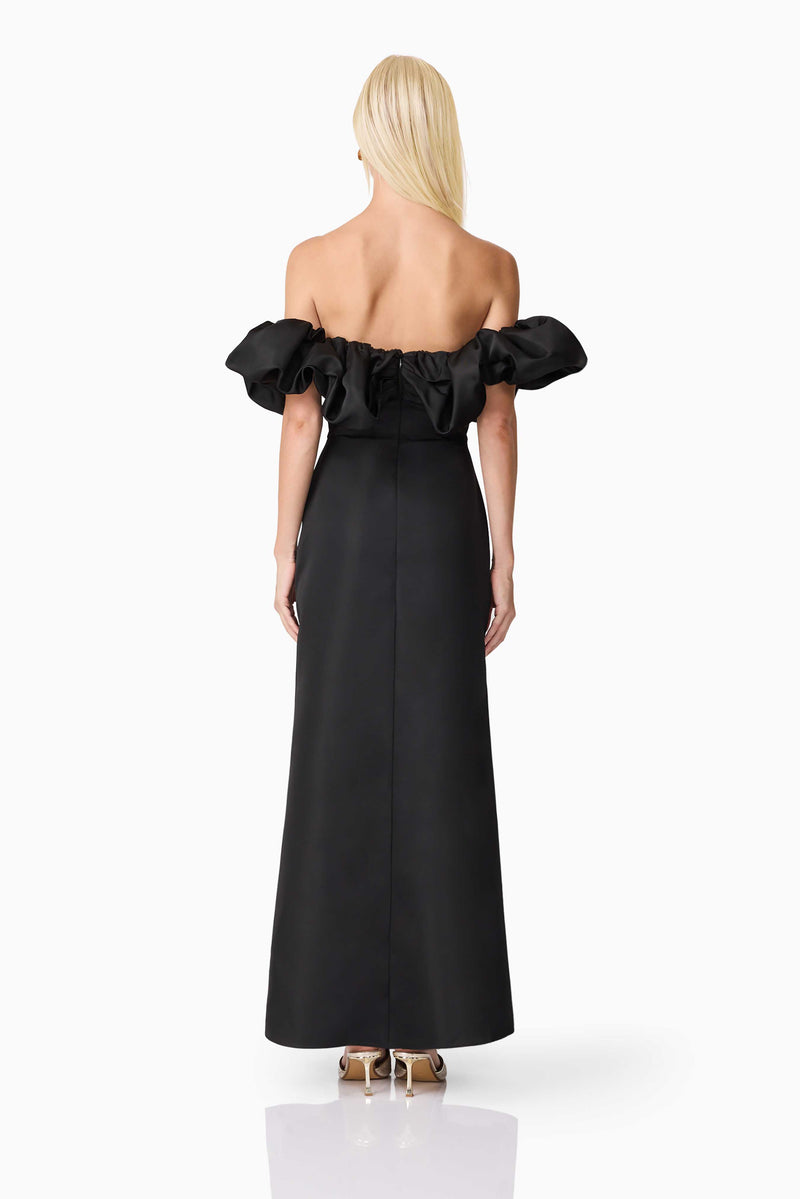 Blonde model wearing Sharon Off The Shoulder Midi Dress in Black back shot