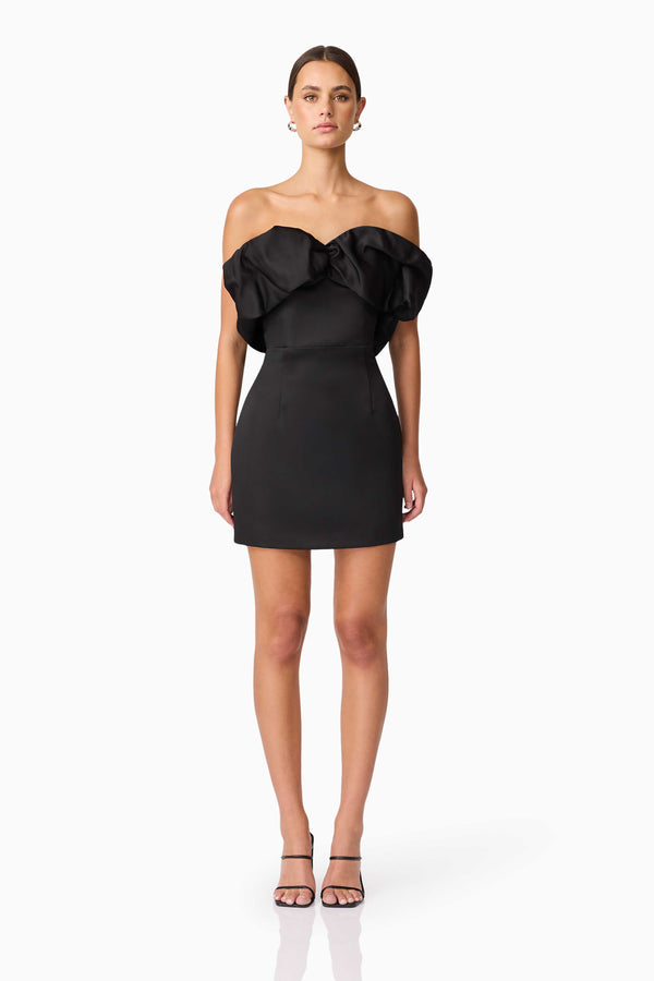 Brunette model wearing Sharon Strapless Mini Dress in Black front shot