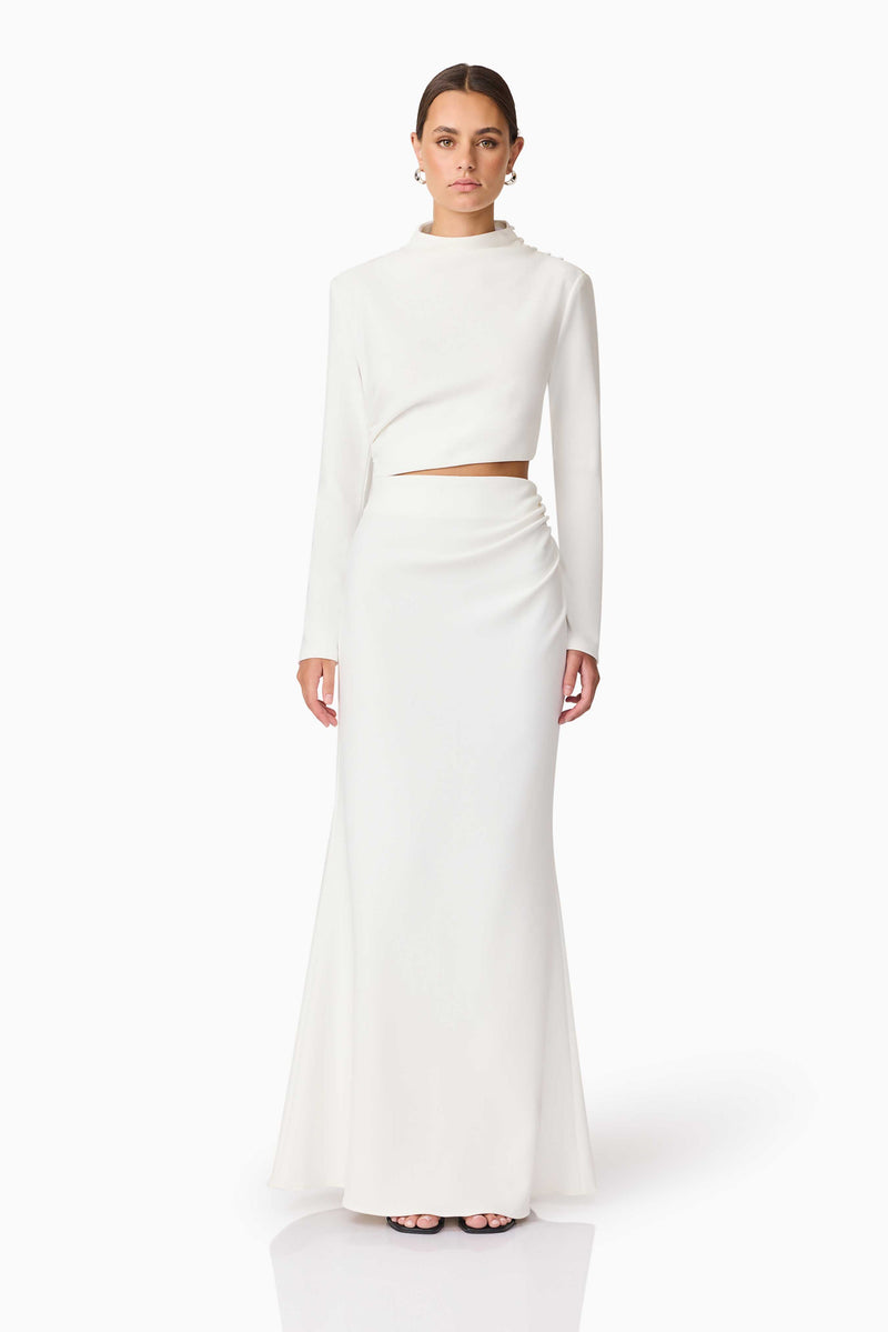 Brunette model wearing Nerissa Long Sleeve Gown in White Front Shot