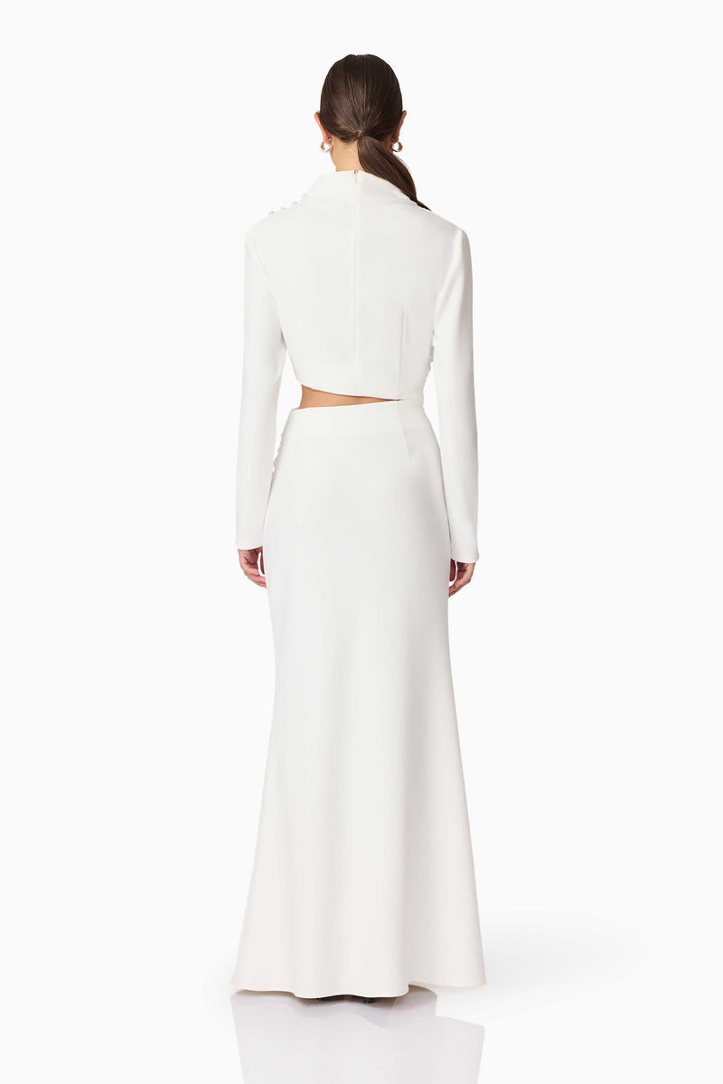 Brunette model wearing Nerissa Long Sleeve Gown in White Back Shot
