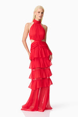 Blonde model wearing Lilja Halter Neck Maxi Dress in Red posed shot